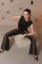 Chain Reaction Flared Trousers – Dual Metal Detail - Vybtheory