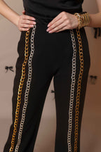 Chain Reaction Flared Trousers – Dual Metal Detail - Vybtheory
