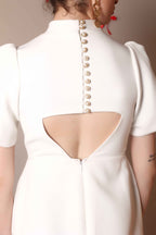 Ivory Bow-Back Mini Dress with Puff Sleeves – Pearl Button Detail - Vybtheory